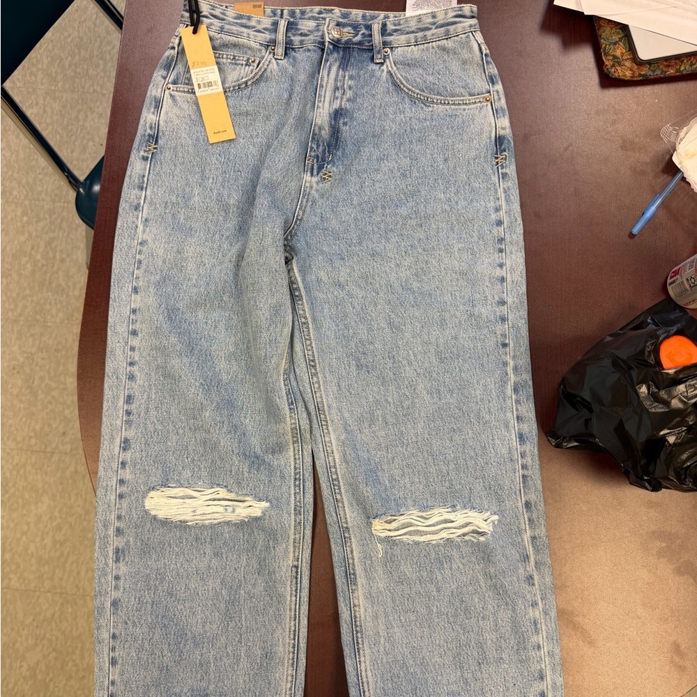 Distressed Light Blue Jeans